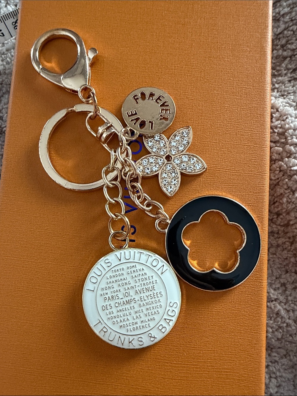 Louis Vuitton Gold-Tone Charm Keyring with Black & White Accents